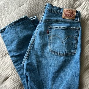 Levi jeans with holes, slightly cropped